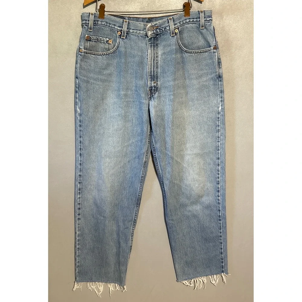 Vintage Levis 550 Mens Relaxed Fit Cut Off Frayed Hem Light Wash Jeans 36x28